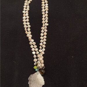 Elegant Pearl Necklace with Leaf Pendant